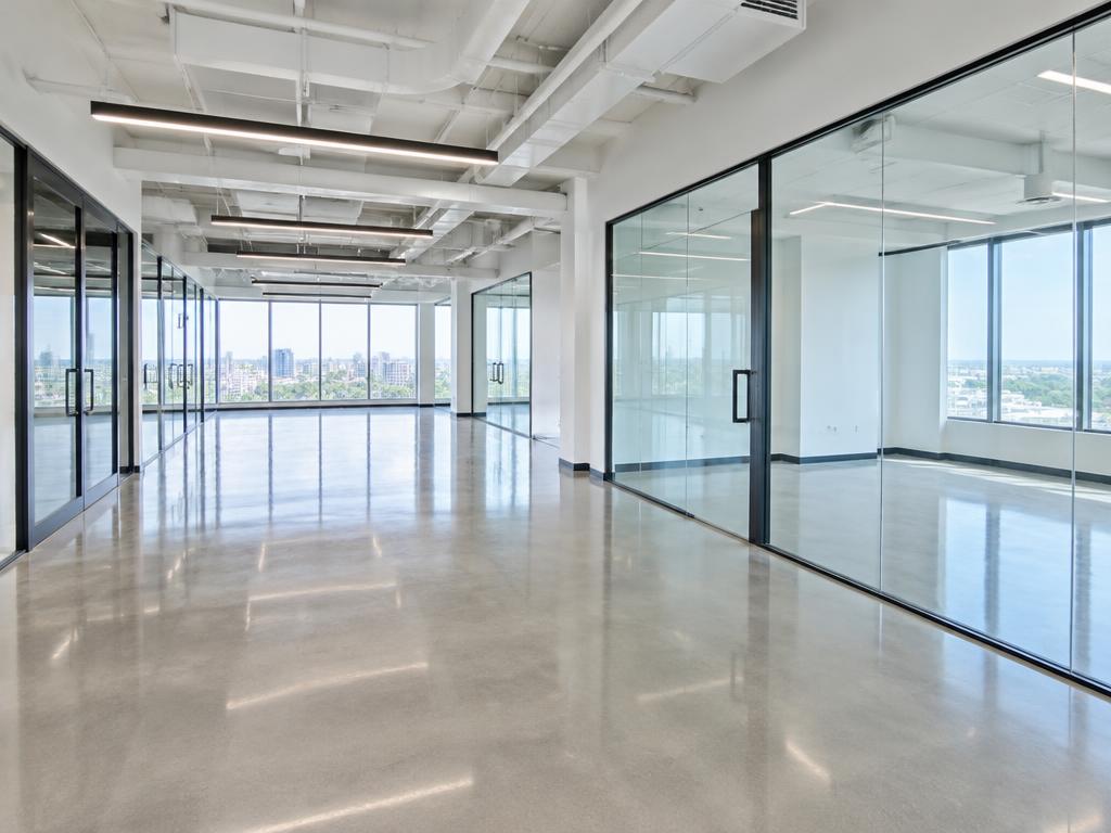 Empty newly finished commercial office space with polished concrete floors