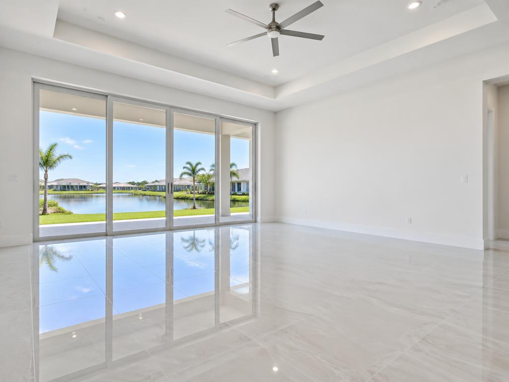 Sliding glass doors and polished floors in a new Florida home